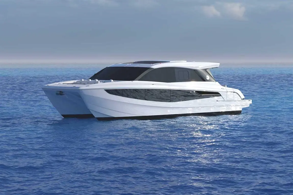 A modern white luxury yacht glides over calm blue ocean waters under a clear sky.
